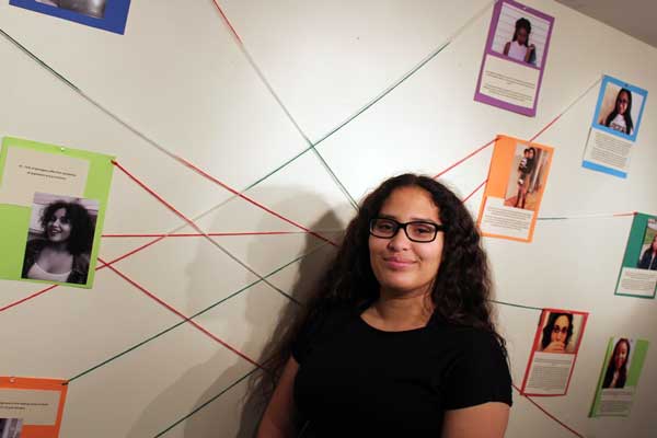 Kimberly Nieves showcases her work at a gallery exhibit and presentation event with our partners at Youth In Action.